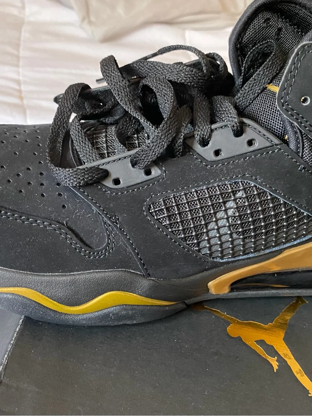 Jordan Men's Black Suede Sneakers with Gold Accent